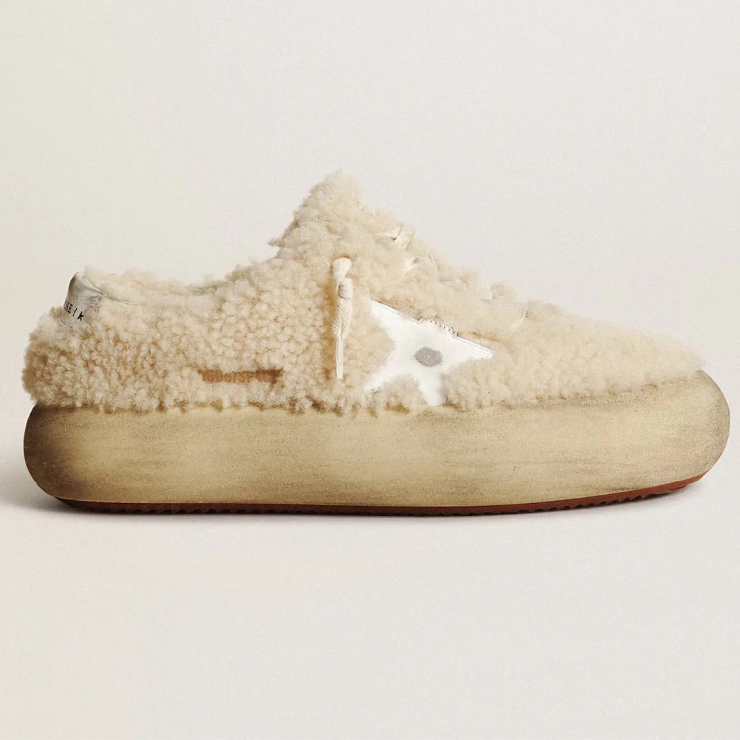 Womens Space Star shoes in beige shearling with white leather star and metallic leather heel tab